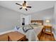 Bright bedroom featuring wood floors, a ceiling fan, and neutral paint at 1155 Palmetto St., Georgetown, SC 29440