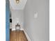 Inviting foyer with hardwood floors, neutral walls, and a decorative light fixture at 1155 Palmetto St., Georgetown, SC 29440