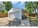 Detached garage with roll up door, side workspace and fenced yard at 1155 Palmetto St., Georgetown, SC 29440
