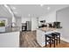 Spacious kitchen with granite countertops, stainless steel appliances, and a breakfast bar with stools at 1155 Palmetto St., Georgetown, SC 29440
