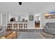 Comfortable living room with bar seating to the kitchen and open to the dining room at 1155 Palmetto St., Georgetown, SC 29440