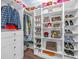Well-organized walk-in closet features custom shelving, drawers, and ample storage at 116 Glengrove Lane, Murrells Inlet, SC 29576