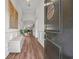 Inviting foyer with hardwood floors, arched doorways, and elegant wainscoting at 116 Glengrove Lane, Murrells Inlet, SC 29576