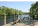 Relaxing scene with benches overlooking a tranquil river, offering a serene and picturesque view at 118 Westfield Circle, Conway, SC 29526