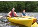Personal and kayaking on a scenic waterway surrounded by lush green trees at 118 Westfield Circle, Conway, SC 29526