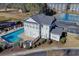 Aerial view of a home with a pool and a hot tub at 121 Waypoint Ridge Ave. # P-15, Little River, SC 29566