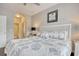 Comfortable bedroom with a view into a bright bathroom at 121 Waypoint Ridge Ave. # P-15, Little River, SC 29566