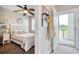 Cozy bedroom featuring a ceiling fan and access to a private balcony at 121 Waypoint Ridge Ave. # P-15, Little River, SC 29566