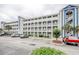 Condo building with multiple stories, balconies, and parking in front at 121 Waypoint Ridge Ave. # P-15, Little River, SC 29566