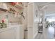 Efficient laundry area with a washer, dryer, and storage shelves at 121 Waypoint Ridge Ave. # P-15, Little River, SC 29566