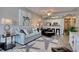Open floor plan with living room showing stylish furniture and modern decor at 121 Waypoint Ridge Ave. # P-15, Little River, SC 29566