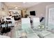 Open-concept living and dining areas filled with natural light and comfortable seating at 121 Waypoint Ridge Ave. # P-15, Little River, SC 29566