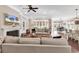Bright living room with cozy seating, a fireplace, and an open layout perfect for entertaining at 1210 East Isle Of Palms Ave., Myrtle Beach, SC 29579