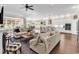 Open-concept living area flows into a gourmet kitchen, featuring hardwood floors and modern design at 1210 East Isle Of Palms Ave., Myrtle Beach, SC 29579