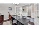 Spacious office features a large desk, hardwood floors, and guitar at 1210 East Isle Of Palms Ave., Myrtle Beach, SC 29579