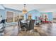 This dining room offers stylish lighting and a great view from the window at 135 S Dunes Dr. # 501, Pawleys Island, SC 29585