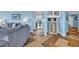 Hallway with views of a living room featuring stylish decor and tile floors at 135 S Dunes Dr. # 501, Pawleys Island, SC 29585