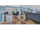 Spacious living area with an open layout connecting the kitchen, dining, and living rooms at 135 S Dunes Dr. # 501, Pawleys Island, SC 29585