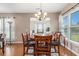 Cozy dining area featuring a wooden table with seating for six, perfect for Gathering meals and entertaining guests at 15 Saltwind Loop, Murrells Inlet, SC 29576