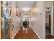 Elegant foyer featuring gleaming hardwood floors, neutral walls, and a view into the spacious living areas of the home at 15 Saltwind Loop, Murrells Inlet, SC 29576
