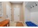 Mud room entrance with a bench and coat rack at 15 Saltwind Loop, Murrells Inlet, SC 29576