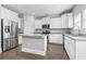 Kitchen with a large island, granite countertops, and modern stainless steel appliances at 1600 Palmetto Palm Dr., Myrtle Beach, SC 29579