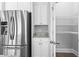 Stainless steel refrigerator and pantry, granite countertop, and cabinetry at 1600 Palmetto Palm Dr., Myrtle Beach, SC 29579