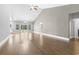 Bright living room with hardwood flooring, high ceilings, and a large sliding glass door at 1600 Palmetto Palm Dr., Myrtle Beach, SC 29579