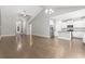 Open living space concept showcasing the kitchen, living and dining areas and hardwood floors at 1600 Palmetto Palm Dr., Myrtle Beach, SC 29579