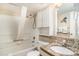 Bathroom with a shower and tub, and a granite countertop sink at 1605 S Ocean Blvd. # 204, Myrtle Beach, SC 29577