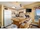 Well-lit kitchen with updated appliances, breakfast bar and tile backsplash at 1605 S Ocean Blvd. # 204, Myrtle Beach, SC 29577