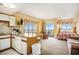 Open living area with kitchen, TV, bedroom, and balcony access, with ocean view at 1605 S Ocean Blvd. # 204, Myrtle Beach, SC 29577
