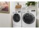 Laundry room featuring a modern washer and dryer set at 171 Cassina Dr., Longs, SC 29568