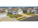 Aerial view of a well-maintained home with manicured landscaping in a suburban neighborhood at 1723 Perthshire Loop, Myrtle Beach, SC 29579