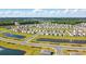 Beautiful community with multiple homes near tranquil ponds, designed for relaxed living and natural scenery at 1723 Perthshire Loop, Myrtle Beach, SC 29579