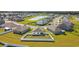 Aerial view of a home's backyard, featuring a white fence and well-maintained lawn in a Gathering-friendly community at 1723 Perthshire Loop, Myrtle Beach, SC 29579