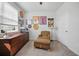 Cozy room featuring a ceiling fan, an armchair, desk, and a carpet at 1723 Perthshire Loop, Myrtle Beach, SC 29579