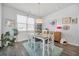Bright dining area with stylish table and chairs, complemented by modern decor and natural light at 1723 Perthshire Loop, Myrtle Beach, SC 29579