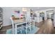Charming dining space adjacent to kitchen, with stylish décor and hardwood flooring at 1723 Perthshire Loop, Myrtle Beach, SC 29579