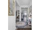 Inviting entryway with hardwood floors, a stylish rug and elegant decor at 1723 Perthshire Loop, Myrtle Beach, SC 29579