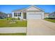 Single Gathering home with well-manicured lawn, driveway and front door at 1723 Perthshire Loop, Myrtle Beach, SC 29579