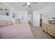 Spacious main bedroom with a comfortable bed, soft lighting, and ensuite bathroom at 1723 Perthshire Loop, Myrtle Beach, SC 29579