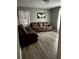 Cozy living room with comfortable leather seating and minimalist decor in a relaxing setting at 1903 Rose St., Conway, SC 29527