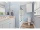 Bathroom featuring a vanity, toilet, shower with glass door, and modern fixtures at 201 West Isle Of Palms Ave., Myrtle Beach, SC 29579