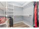 Walk-in closet with ample shelving and storage space perfect for organization at 201 West Isle Of Palms Ave., Myrtle Beach, SC 29579