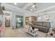 Open-concept living room featuring wood floors, neutral paint colors, and seamlessly connects to the dining and kitchen areas at 201 West Isle Of Palms Ave., Myrtle Beach, SC 29579