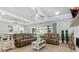 Comfortable living room with ceiling fan, recessed lights and view to kitchen and dining rooms at 201 West Isle Of Palms Ave., Myrtle Beach, SC 29579