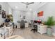 Spacious home office with a ceiling fan, offering plenty of desk and storage space at 201 West Isle Of Palms Ave., Myrtle Beach, SC 29579