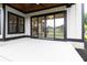 Back porch with sliding glass doors leading into the home and a view of the backyard at 2205 Yellow Morel Way, Myrtle Beach, SC 29579