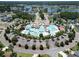 Aerial shot of a resort-style community pool surrounded by lush landscaping at 2205 Yellow Morel Way, Myrtle Beach, SC 29579